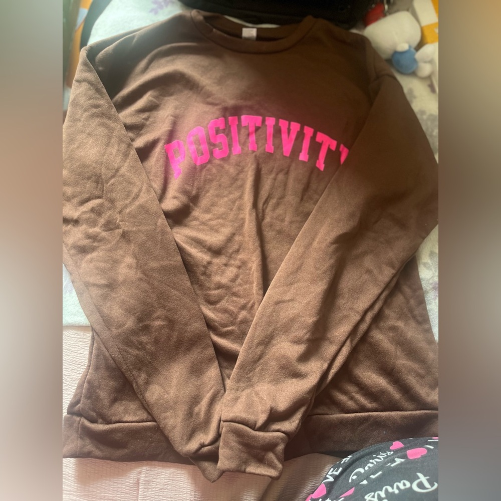 Brown “POSITIVITY” Sweater